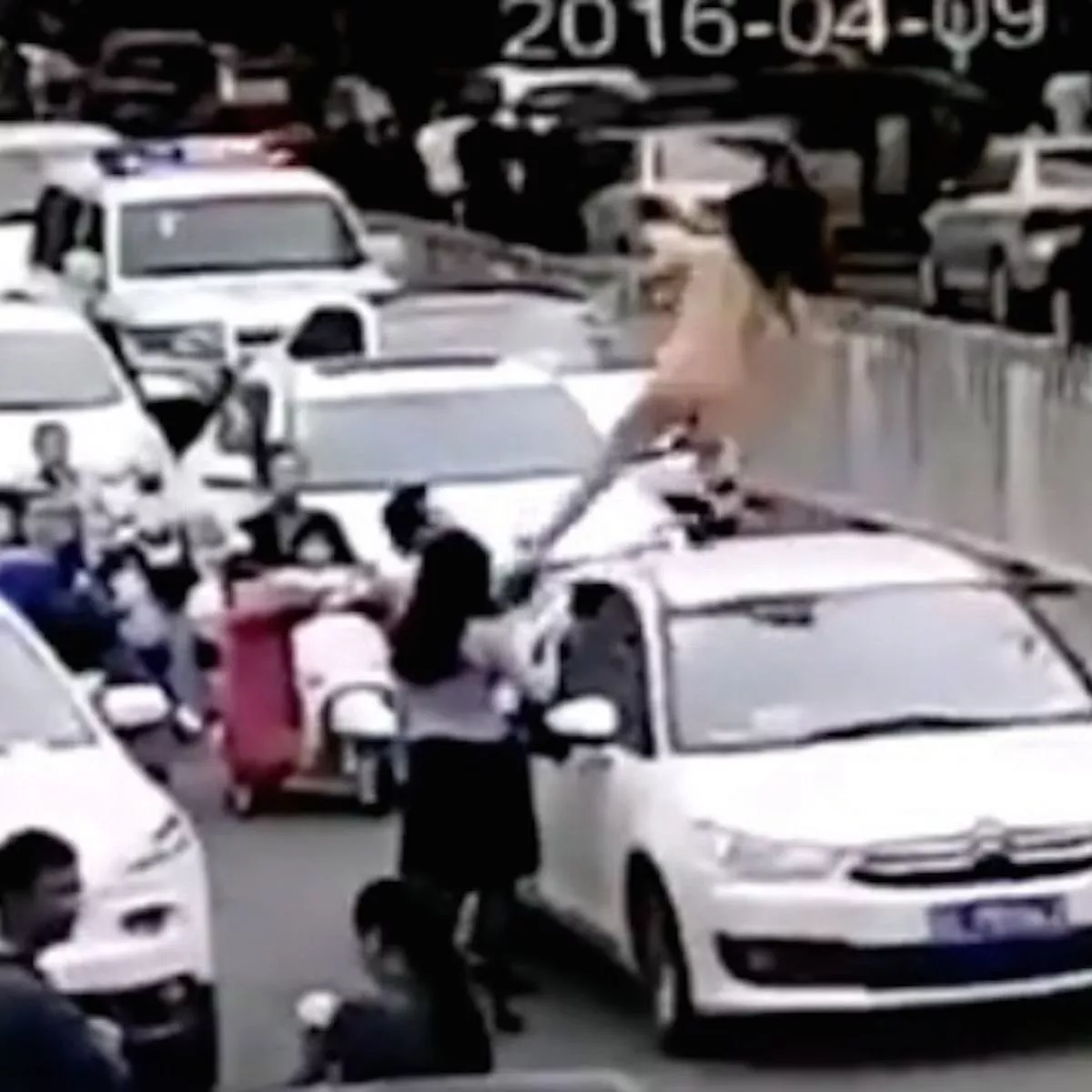 brian dudkowski add naked lady in car photo